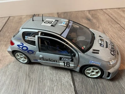 Peugeot 206 WRC Rallye Modellauto • 1:18 Solido • Grönholm / Rautiainen • Clario - Bild 1 von 4