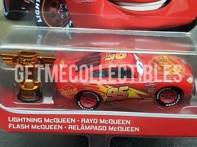 DISNEY PIXAR CARS LIGHTNING MCQUEEN WITH PISTON CUP TROPHY 2021 SAVE 6% GMC - Image 1 of 3