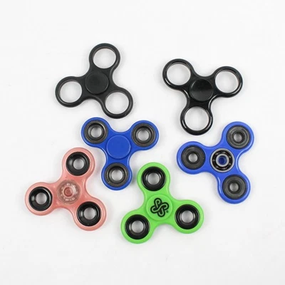 Lot of 6 Fidget Spinner Toys in Various Colors - Image 1 of 4