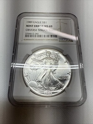1989 Silver Eagle Mint Error Ms69 Obverse Struck Thru - Image 1 of 2