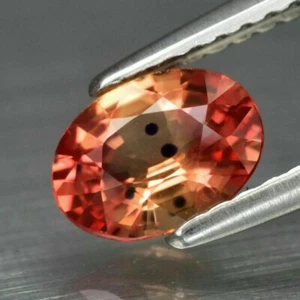 VS 0.84ct 6.8x5mm Oval Natural Orange Sapphire Songea, Tanzania (Ver Video) - Imagen 1 de 2