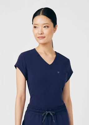 Blusa Médica Scrubs and Beyond White Cross CRFT 1 Bolsillo Cuello en V Azul Marino Grande Foto 1 de 4