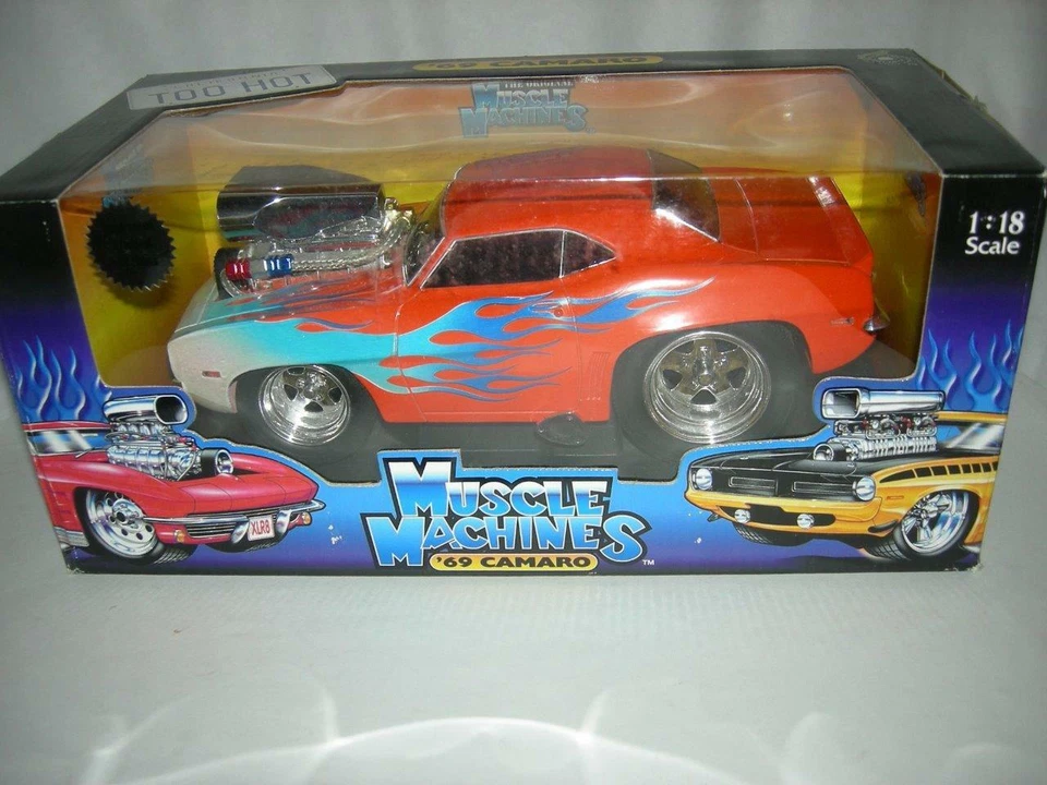 69 Chevy Camaro Orange with Flames  new in box 1:18 sc. Mus. Mach.. - Image 1 of 1
