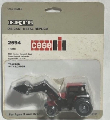 ERTL Case IH 2594 con tractor cargador frontal, cosecha Husker 1987, 1/64, nuevo en caja Foto 1 de 2
