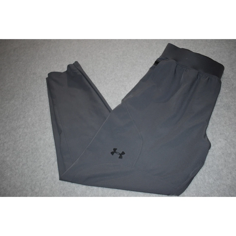 Pantalones de chándal Under Armour para gimnasio para hombre talla grande ajustados cónicos rendimiento gris Foto 1 de 4