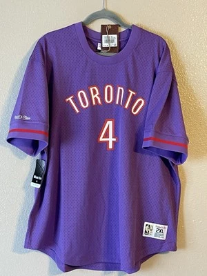 Men’s 2XL NWT Toronto Raptors Mitchell & Ness 2003 Chris Bosh Mesh Shirt Purple - Image 1 of 4