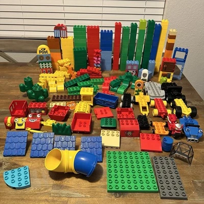 280+ Lote de bloques de construcción LEGO Duplo piezas, colores y vehículos surtidos Foto 1 de 4
