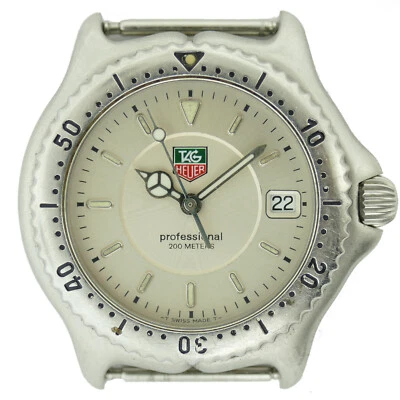 TAG HEUER PROF WI1210 СЕРЕБРЯНЫЙ ЦИФЕРБЛАТ S.S. СРЕДНЕГО РАЗМЕРА ГОЛОВКА ЧАСОВ НА ЗАПЧАСТИ ИЛИ РЕМОНТ - Изображение 1 из 4