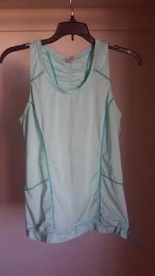 Camiseta sin mangas deportiva activa Lucy para mujer talla S bolsillos traseros acanalados azul usada Foto 1 de 4