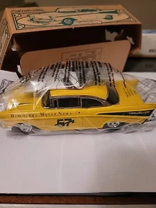 ERTL 1957 CHEVY SAUMINGS MOTOR NEWS GELB. BRANDNEU MIT BOX. - Bild 1 von 6