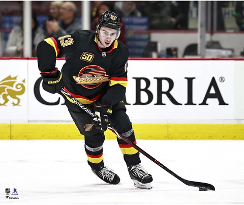 Quinn Hughes Vancouver Canucks Unsigned Black Alternate Jersey Photograph Cover