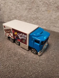 Camión de carretera Hot Wheels General Mills 1997 promoción de cereales cabina azul. Cocoa Puffs - Imagen 1 de 7