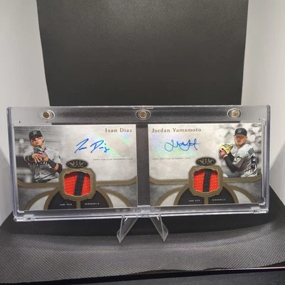 2020 Topps Tier One Dual Relic Book /10 Isan Diaz Jordan Yamamoto Rookie Auto RC - Image 1 of 2