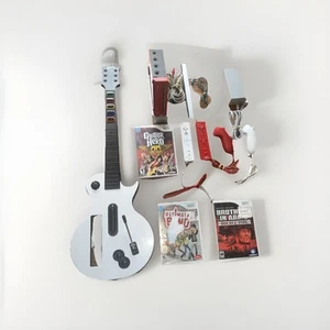 Wii Console RVL 101 Console:Games,Controllers, Guitar, and Cords -working - Picture 1 of 7
