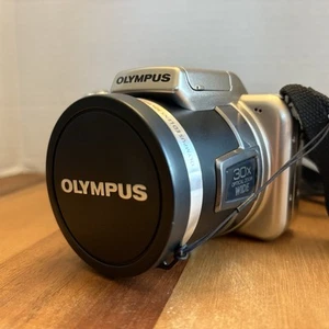 Olympus SP-810UZ 14 MP Digital Camera 30x Optical Zoom Wide 1:2.8-5.6 w/Extras - Picture 1 of 10