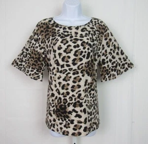 TUNICA TOP SUZSAN INCISIONE STAMPA LEOPARDATA MEDIA TOP POLI SPANDEX MANICHE A CAMPANA - Foto 1 di 12