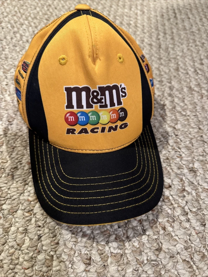 Kyle Busch Joe Gibbs racing M & M's 2020 Uniform Nascar  hat *decals* - Image 1 of 4