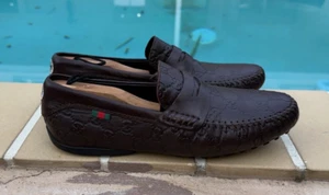 GUCCI BROWN LOGO EMBOSSED LEATHER PENNY LOAFERS Sz 6.5C MADE IN ITALY - Picture 1 of 21