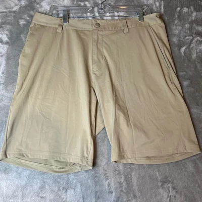 Pantalones Cortos Rhone Commuter Caqui Elastizados Rendimiento Para Hombre Talla 35 Foto 1 de 4