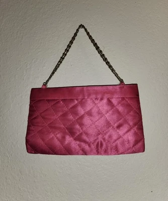 Bolso de mano rosa con flecos punto de látigo y bolsillos de moda Foto 1 de 4