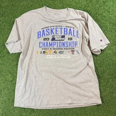 NCAA DIVISION 1 Hombre CAMPEONATO DE BALONCESTO Camiseta Talla XL Gris CAMPEÓN Foto 1 de 4