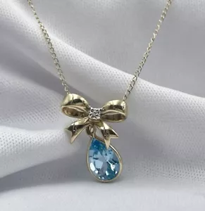 Schleife inspiriert Blautopas mit Diamant Akzent Unikat 14k Gelbgold Anhänger - Bild 1 von 9