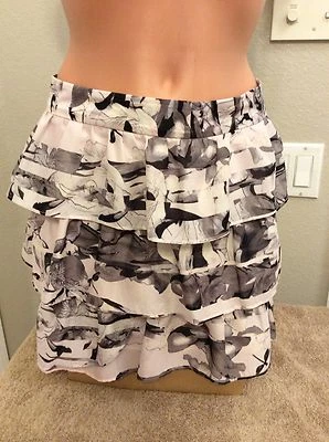 Falda con volantes JESSICA SIMPSON. Rosa, gris, negro. Forrado. Talla 7/8. NUEVO. Foto 1 de 4