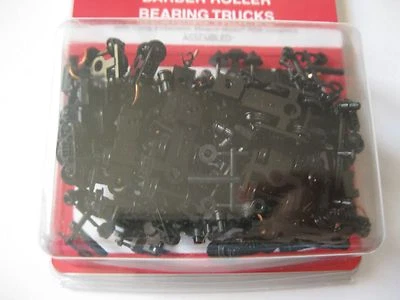 Micro-Trains Stock #00310044 (1038-10) Roller Bearing Trucks Long Couplers - Image 1 of 3