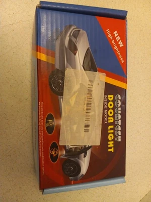 Proyector de luz de puerta de cortesía modelo interior para Dodge RAM Foto 1 de 4