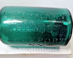 RARE C.W. Merchant Chemist , Lockport NY vintage green glass bottle embossed - Picture 1 of 9
