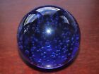 A Heavy Cobalt Blue Paperweight with Bubbles