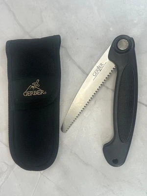 Cuchillo hoja de sierra plegable vintage GERBER EE. UU. caza juego sierra camping con funda Foto 1 de 4
