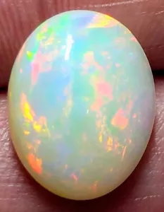 3.8ct Welo Opal Oval Cabochon AAA Rainbow Red Flash Loose Ethiopian VIDEO - Picture 1 of 7