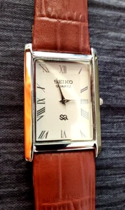 *-*RARO Reloj de Vestir Hombre Tanque Rectangular Esfera Blanca Banda Marrón Nuevo Mvt & Batt - Imagen 1 de 3