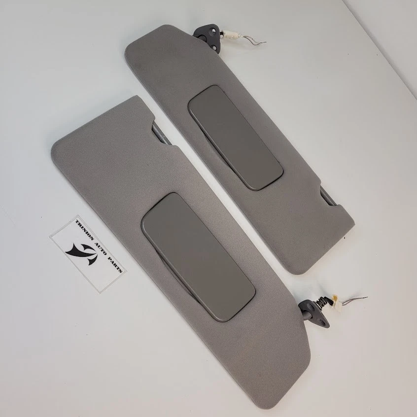 Par de parasoles gris tela con luces de espejo OEM Toyota Avalon 2002-2004 Foto 1 de 4