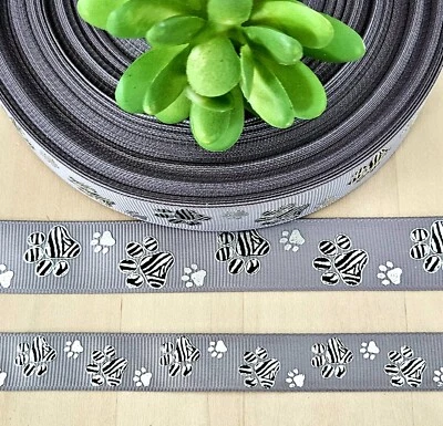 5/8 & 7/8" (1 YD) Dog Paw Grosgrain Ribbon Silver Foil Paw Print Craft Ribbon - Image 1 of 2