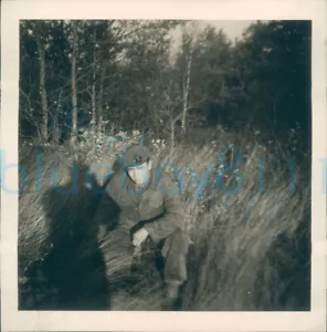 1950s Belgian Army Photo Soldier crouched in bushes 3.2x3.2" - Picture 1 of 2
