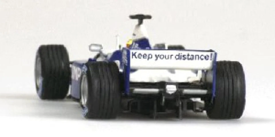 Minichamps 400010125 WILLIAMS BMW FW23 KEEP YOUR DISTANCE R.SCHUMACHER 2001 1:43 - Image 1 of 1