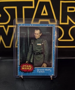 π₯π₯1977 STAR WARS SERIES 1 CARD #8 GRAND MOFF TARKIN (BLUE BOARDER) - Picture 1 of 5
