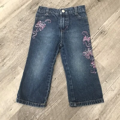 Pantalones de mezclilla descoloridos Glory para niñas azules talla 24M mariposas bordadas cremallera elástica Foto 1 de 4