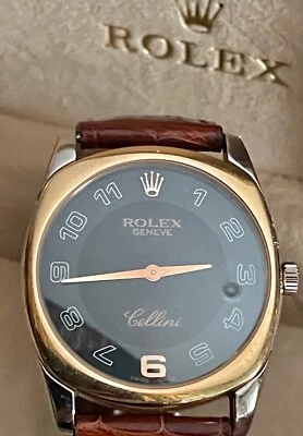Rolex Cellini oro 18k Danaos 4233 reloj con esfera negra, correa cocodrilo marrón Foto 1 de 4