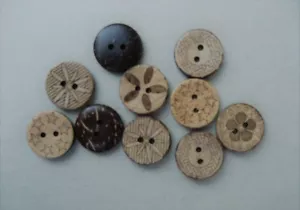 CRAFT-SEWING/KNITTING-BUTTONS 10 x 18mm Tan/Brown Coconut Asst Design 2 Hole - Picture 1 of 1