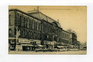 Postal de colección Natick MA Mass letreros de calle principal coches antiguos, construcción de puentes - Imagen 1 de 2