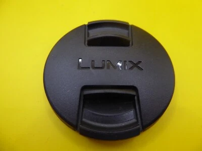 EXCELLENT! Panasonic LUMIX 55mm DMC Plastic Snap-On / side Pinch Front Lens Cap - Image 1 of 4