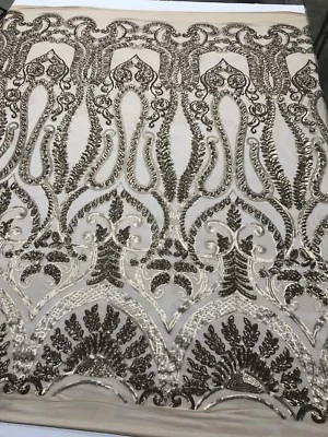 TAUPE DIVA DESIGN EMBROIDER SEQUINS ON A NUDE 4 WAY STRETCH MESH-SOLD BY YARD. - Image 1 of 4