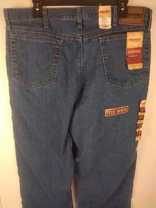 Wrangler Rugged Wear Relaxed Fit Stretch Blue Jeans Size 38-34 - New.     (BLDG) - Picture 1 of 17