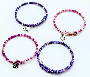 Lotto moda bracciali monovolume perline rosa e viola. nuovo senza etichette - Foto 1 di 5
