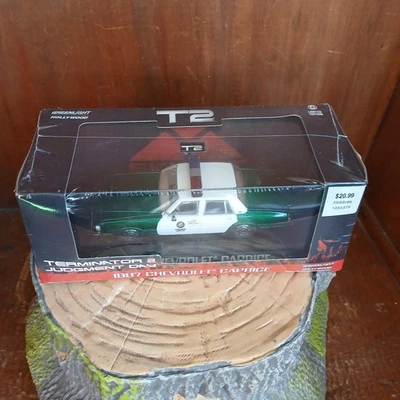 GREENLIGHT 1:43 TERMINATOR 2 1987 CHEVROLET CAPRICE GREEN LIMITED EDITION ONS  - Image 1 of 4