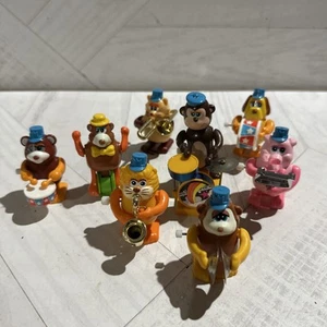 Set 8 giocattoli vintage TOMY Wind Up animali non così grand band anni 80 - Foto 1 di 7
