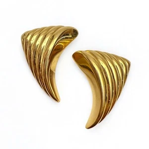 Pendientes de clip acanalados ondulados esculturales vintage Yves Saint Laurent YSL tono dorado - Imagen 1 de 5